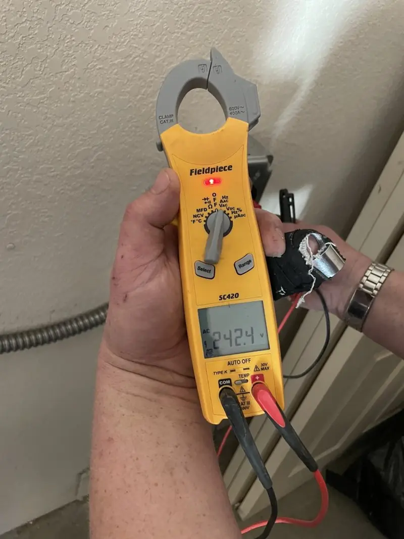 Voltage testing with clamp meter during Generator Installation in Dos Palos